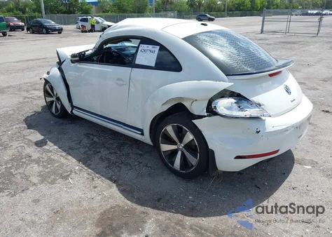 2013 Volkswagen Beetle 2.0T Turbo z USA, uszkodzony, nr VIN 3VWVT7AT7DM677674